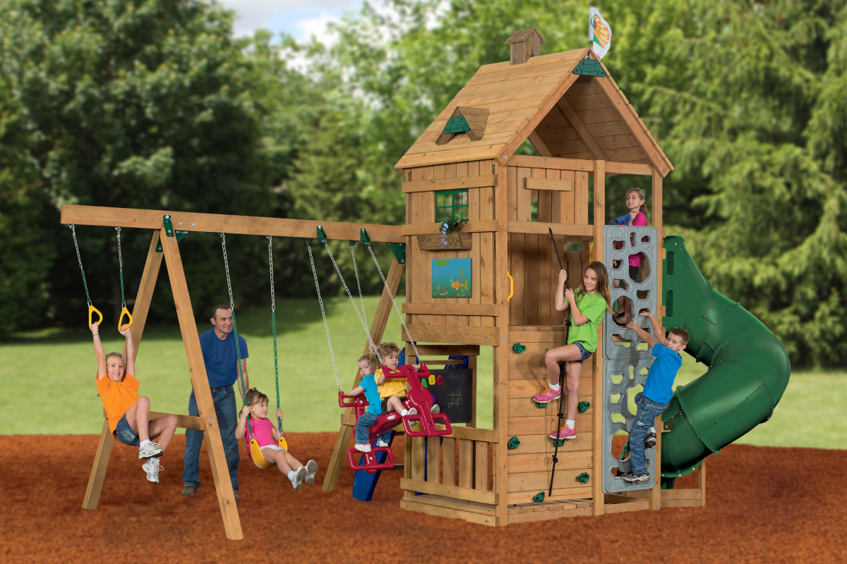 Family playing on playset